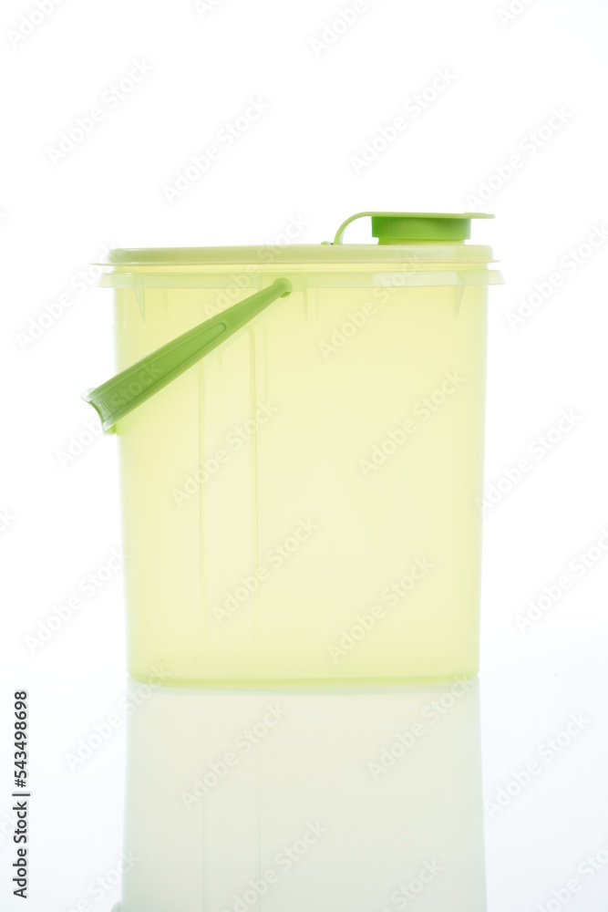 Modern green plastic pitcher isolated on white background. Modern green plastic pitcher isolated on white background.