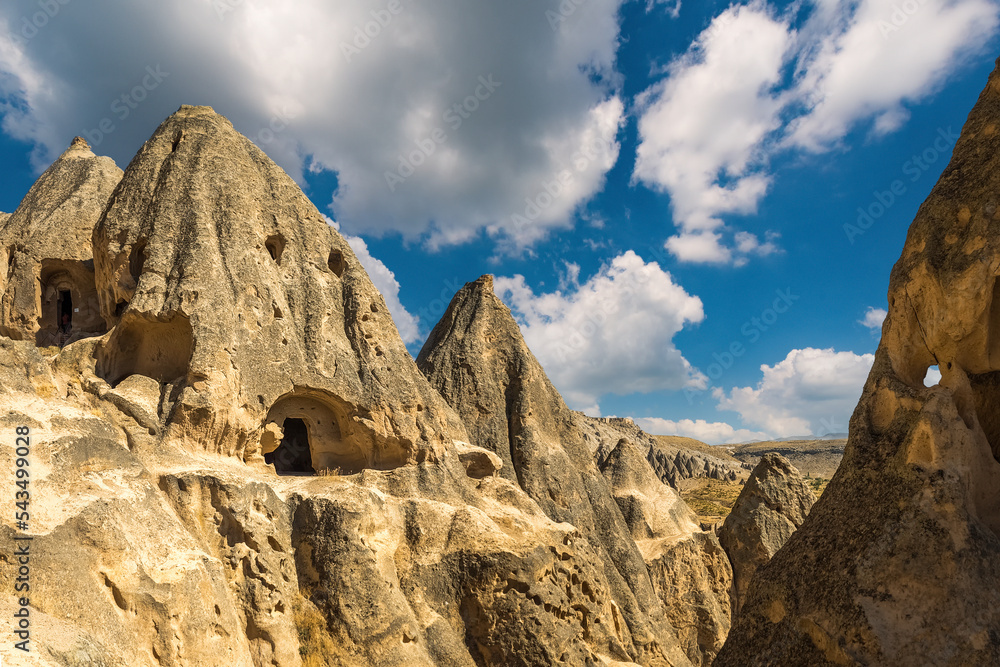 Panoramic view of cone-shaped rock formations in Selime, Cappadocia ...