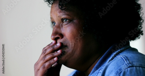 Fotobehang Sad black woman wiping tears in desperation. Person crying