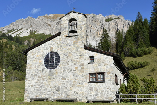 Friedenskapelle in Malbun, Liechtenstein with Gamsgrat Peak in Background photo