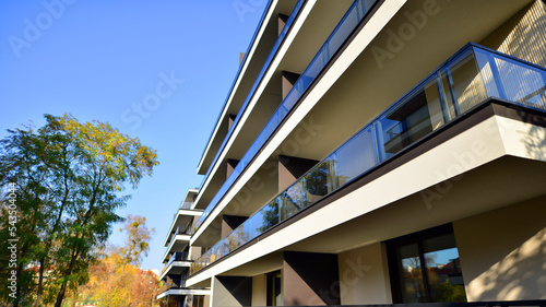 New apartment building on a sunny day. Modern residential architecture. The apartment is waiting for new residents.