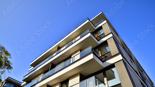 New apartment building on a sunny day. Modern residential architecture. The apartment is waiting for new residents.