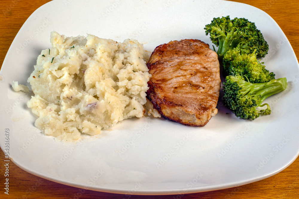 boneless barbecue pork chop with broccoliand red mashed potatoes boneless barbecue pork chop with broccoliand red mashed potatoes