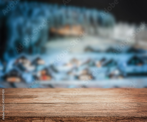 beautiful blue blurred background of winter and shabby table