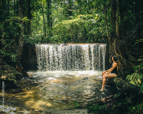 Mulher em cachoeira na selva amazônica,  em Rio preto d eva, Amazonas  photo