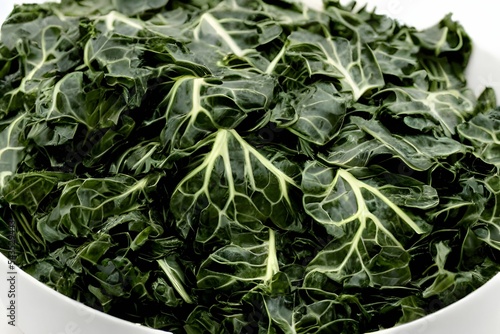 Hyper-realistic illustration of cooked collard greens in a bowl photo