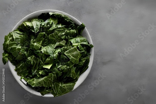 Hyper-realistic illustration of cooked collard greens in a bowl against a gray background photo