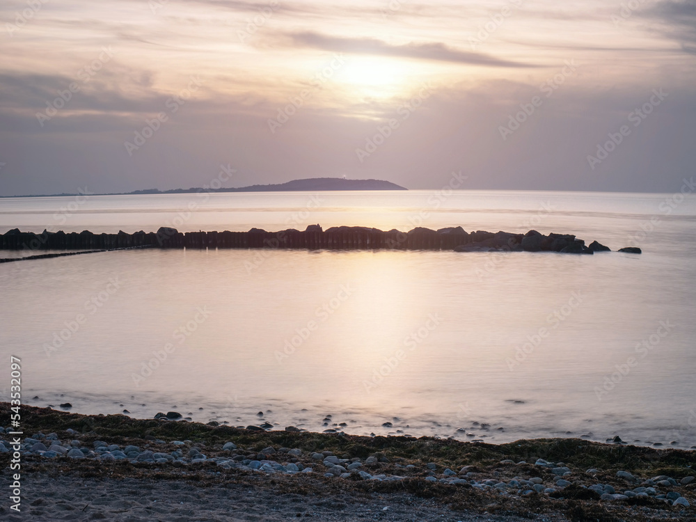 Romantic sunset with Hiddensee island view fro Dranske, Rugen island.