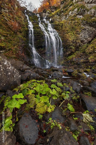 Vertical shot of the Daraganda Waterfall in the natural park of Corno alle Scale photo