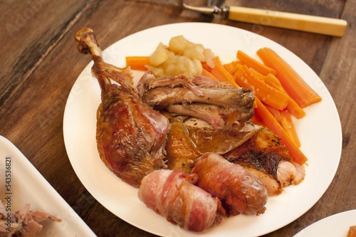 Delicious plated roast turkey dinner with vegetables to celebrate Christmas or Thanksgiving