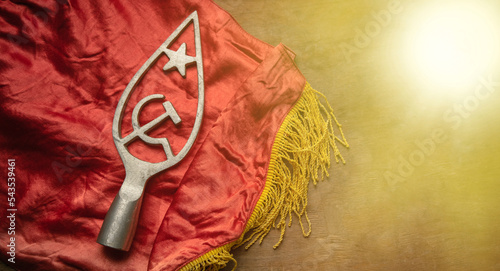 Fotografi Metal pommel on a flag with a star