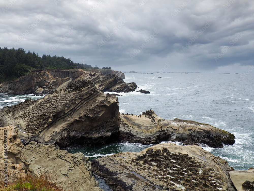 beach and rocks on an overcast day