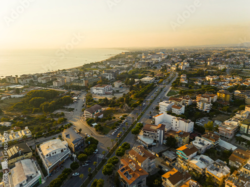 Aerial top view of Side, a resort town, in Antalya Province, Turkey, surrounded by the Mediterranean Sea, during the sunset. High quality photo © PoppyPix