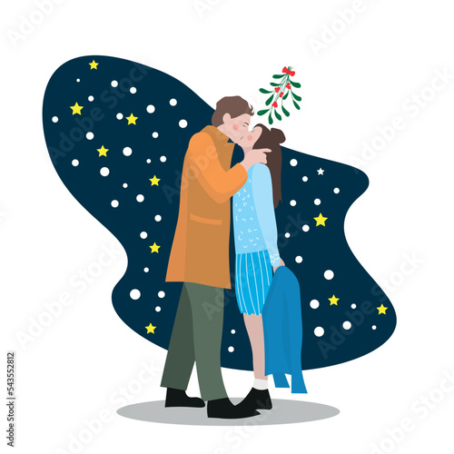Young couple kissing under mistletoe branch on white background