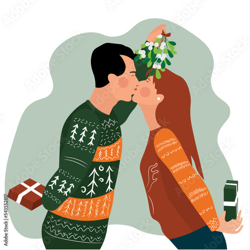 Couple kissing under mistletoe branch on white background