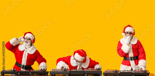 Set of cool Santa DJ on yellow background