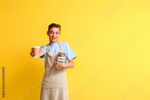Male barista with cup of co...