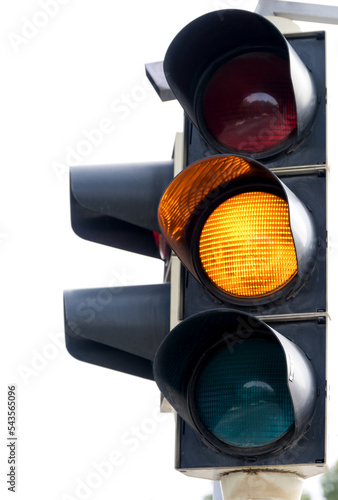 Closeup traffic light showing orange light concept