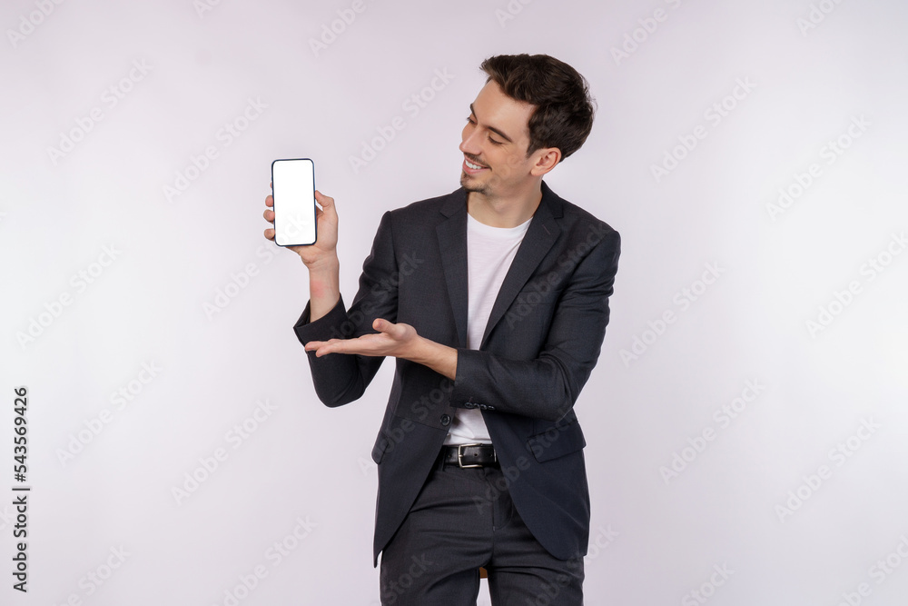 Portrait of young businessman holding smartphone cellphone blank screen with mockup copy space isolated white background