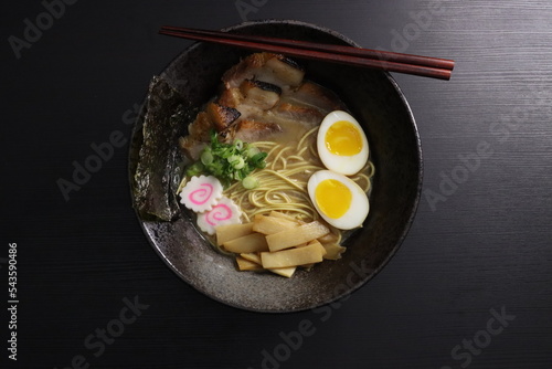 Tonkotsu Instant Ramen With Soy Sauce Egg, Green Onions, Bamboo Shoots, Chashu, Seaweed, Fish Cake, Top Down View