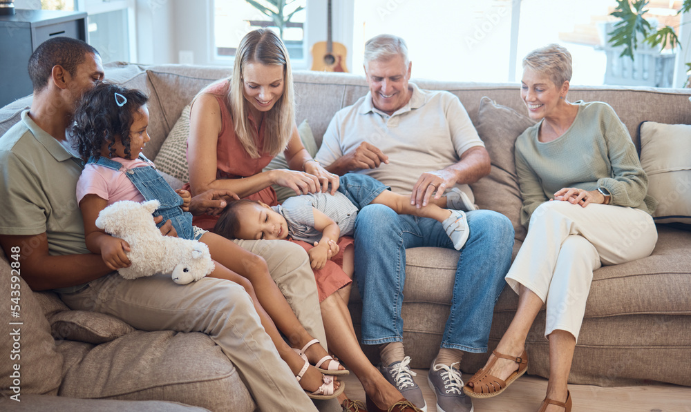 Big family, happiness and love on house sofa with children, parents and grandparents together for bonding, quality time and relax. Happy kids, women and men in interracial family home in Europe Big family, happiness and love on house sofa with children, parents and grandparents together for bonding, quality time and relax. Happy kids, women and men in interracial family home in Europe
