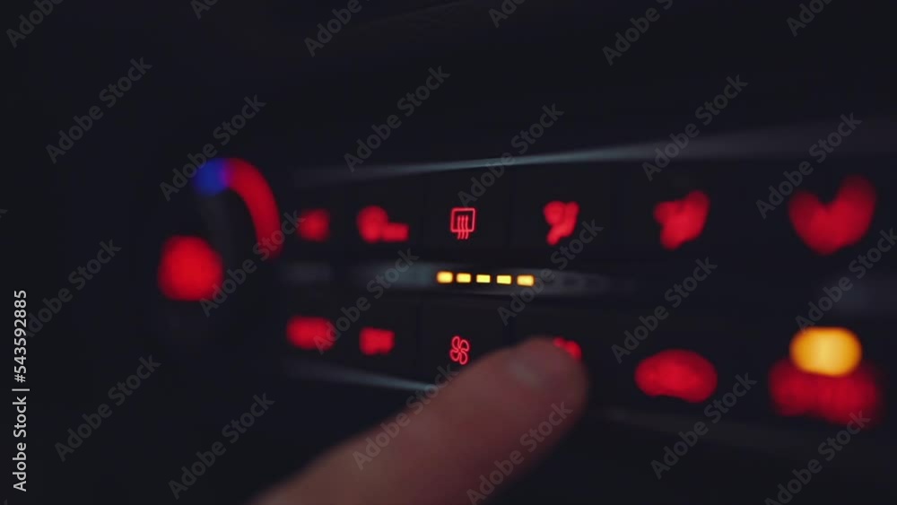 Close-up of the air conditioner in the car, changing the temperature of the car Close-up of the air conditioner in the car, changing the temperature of the car