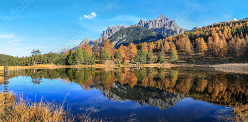 Fotografija Panorama of the Swiss Alps mountain lake Lai Nair (Black Lake) with refleciton o