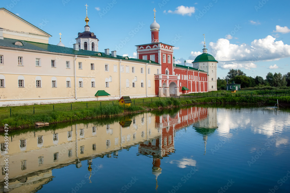 Nikolo-Peshnoshsky monastery and a pond in front of the walls of the monastery