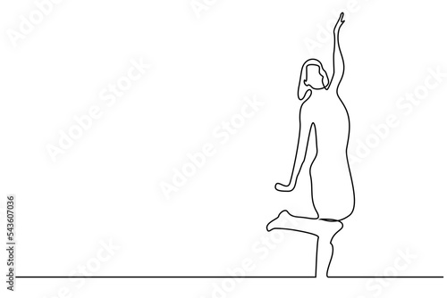 young beautiful woman happily poses