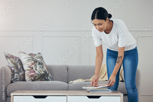 Tableau sur toile Cleaning, living room books and hygiene woman tidy apartment, home or desk table surface for domestic housework