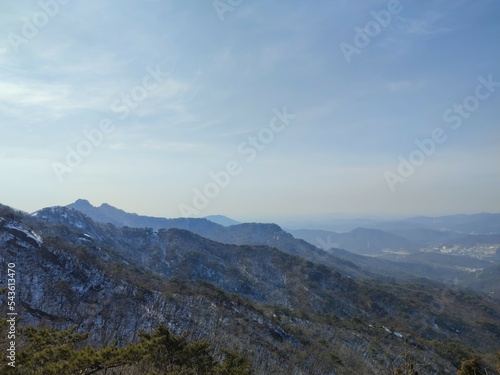 Fototapeta Naklejka Na Ścianę i Meble -  Bukhansan National Park. hiking in Korean mountains. winter hike in the mountains. mountains winter sports.
