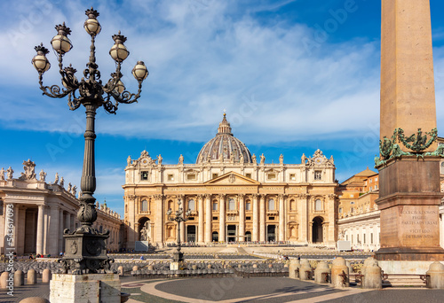 St Peter's basilica and Egyptian obelisk on St Peter's square in Vatican, Rome, Italy (translation "In honor of prince of Apostles; Paul V Borghese, Pope, in year 1612 and 7th year of pontificate)