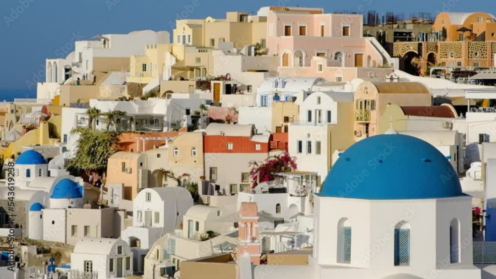Colorful buildings on a hillside at Oia town on Santorini island in Greece Colorful buildings on a hillside at Oia town on Santorini island in Greece