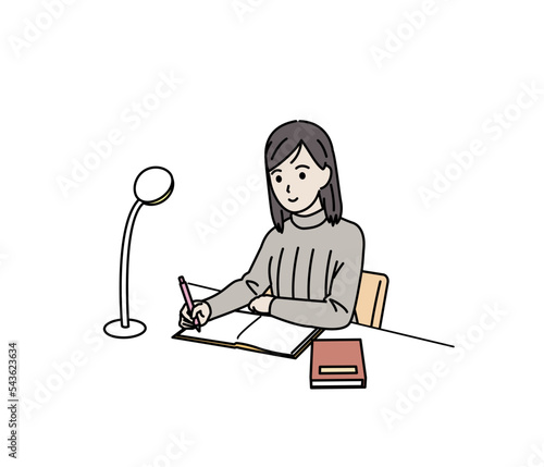 自宅で勉強をする中高生の女の子