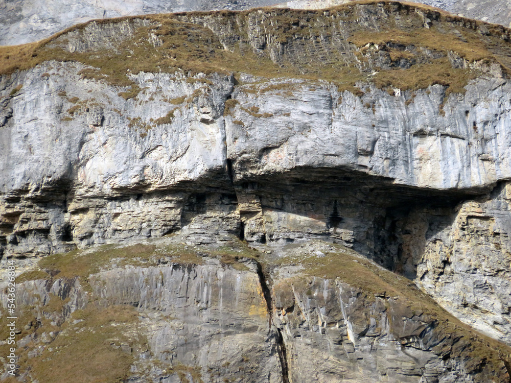 The Cave Adlerhorst or cave eagle's nest (Höhle Adlerhorst) under the alpine peak Piz Fluaz (2814 m) in Glarus Alps mountain massif, Pigniu-Panix - Canton of Grisons, Switzerland (Kanton Graubünden)