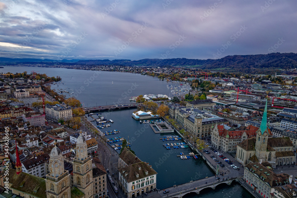 Aerial view of City of Zürich with the old town and Limmat River on a cloudy autumn late afternoon. Photo taken November 4th, 2022, Zurich, Switzerland.