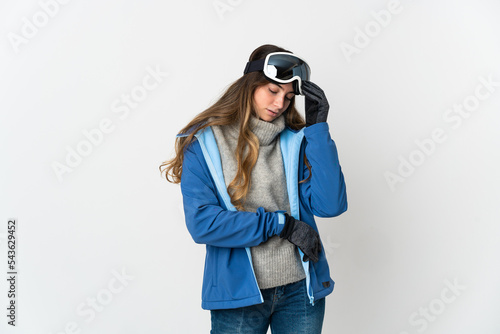 Skier girl with snowboarding glasses isolated on white background with headache © luismolinero
