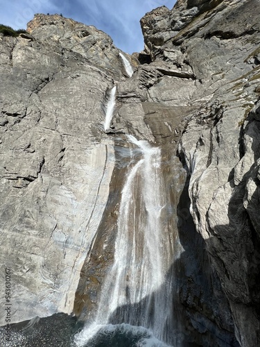 Aua dil Mer Waterfalls or Aua dil Mer Wasserfall (Wasserfälle Aua da Fluaz oder Panixer Fall) over the lake Panixersee (Lag da Pigniu), Pigniu-Panix - Canton of Grisons, Switzerland (Kanton Graubünden photo