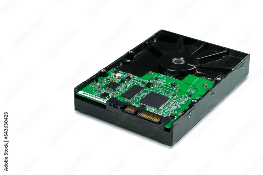 The hard drive for a personal computer is isolated on a white background. HDD chip The hard drive for a personal computer is isolated on a white background. HDD chip