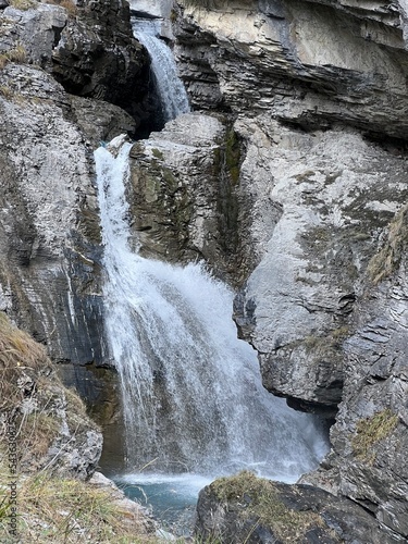 Aua dil Mer Waterfalls or Aua dil Mer Wasserfall (Wasserfälle Aua da Fluaz oder Panixer Fall) over the lake Panixersee (Lag da Pigniu), Pigniu-Panix - Canton of Grisons, Switzerland (Kanton Graubünden photo