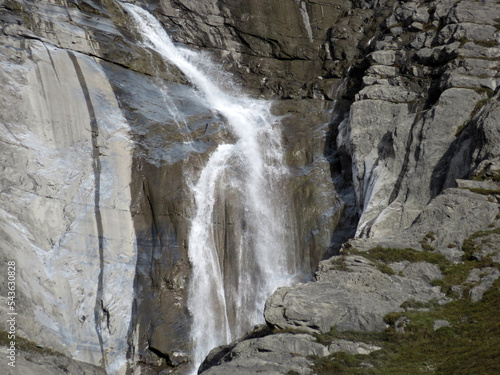Aua dil Mer Waterfalls or Aua dil Mer Wasserfall (Wasserfälle Aua da Fluaz oder Panixer Fall) over the lake Panixersee (Lag da Pigniu), Pigniu-Panix - Canton of Grisons, Switzerland (Kanton Graubünden
