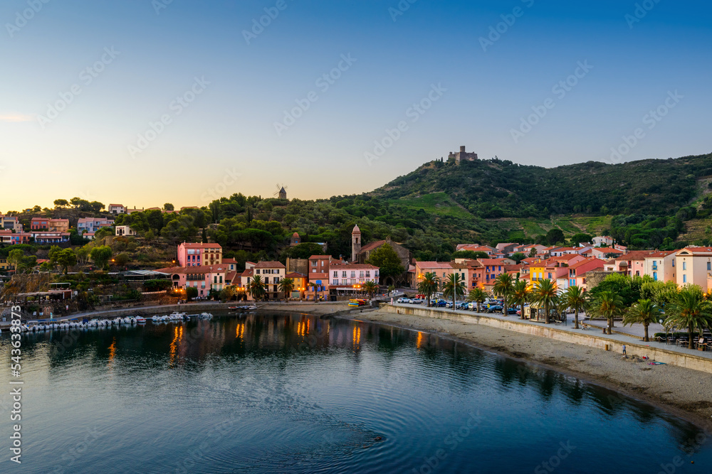 Collioure city and beach at sunrise in France