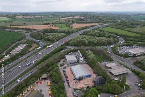 junction of the M25 motorway with the A1 road UK drone aerial view .