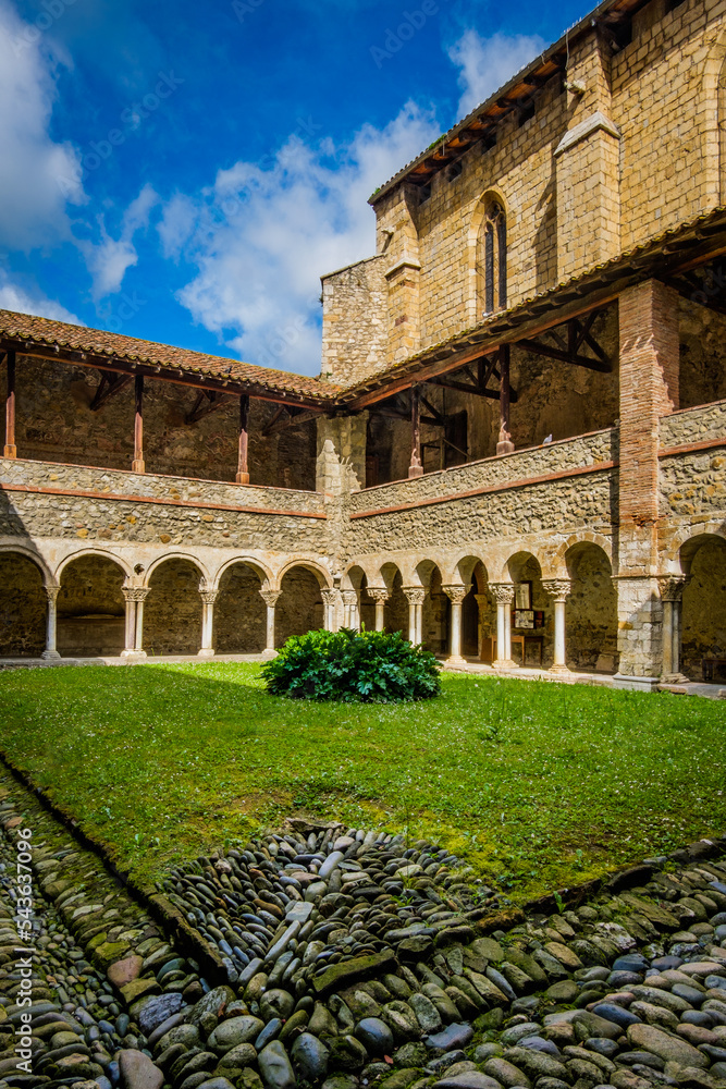 the romanesque cloister of the medieval village of Saint Lizier's cathedral, in the South of France (Ariege)