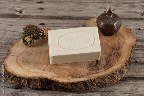 natural handmade soap on a walnut wood floor, white soap with collagen