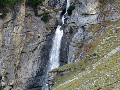 Schmuerf  lle or Schmuer Waterfalls  Cascada da Pigniu oder Aua da Fluaz Wasserf  lle  over the lake Panixersee  Lag da Pigniu   Pigniu-Panix - Canton of Grisons  Switzerland  Kanton Graub  nden  Schweiz