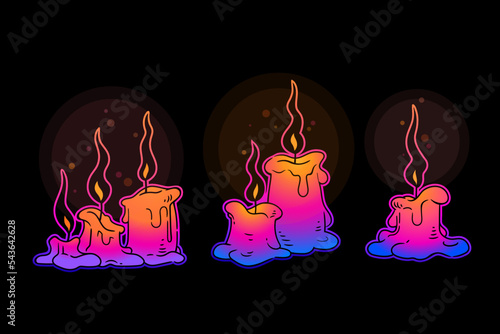 Set of bright multi-colored burning candles