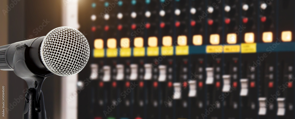 Close up microphone and blur sound mixer background for studio editor  record and broadcasting producer live the media concepts. Photos | Adobe  Stock