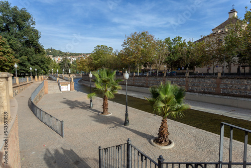 The Genil river flowing through the city of Granada photo