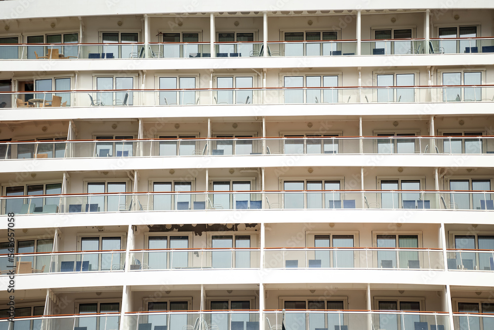 Part of a cruise ship. Cabins with balconies. Part of a cruise ship. Cabins with balconies.